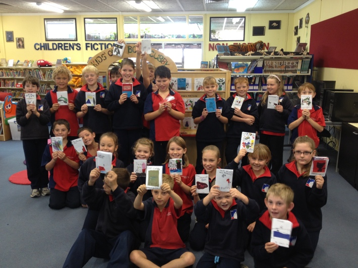Year 5 Kids at the Yorketown School Community Library with their published books